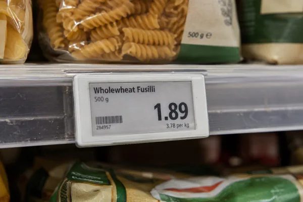 Close-up of an e-paper electronic shelf label installed on a retail shelf